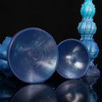 Pearl of the Myco-Web fantasy dildo – concave suction cups of two sizes seen from below