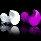 Symbiotic Spiral fantasy dildo – crescent flat bases of both shafts seen end-on